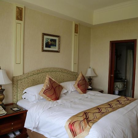 Huiquan Dynasty Hotel Κινκντάο Δωμάτιο φωτογραφία