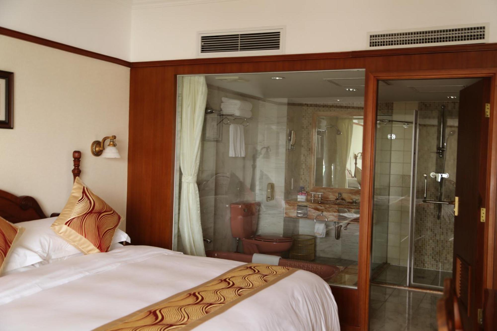 Huiquan Dynasty Hotel Κινκντάο Δωμάτιο φωτογραφία